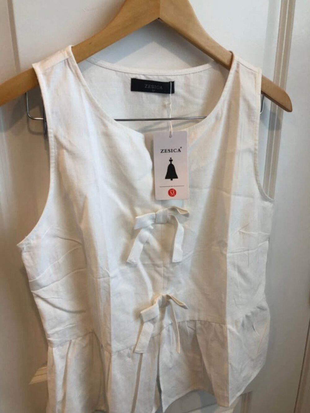 ZESICA Women's Summer Sleeveless Peplum Tank Tops Tie Front Ruffle Babydoll Med.